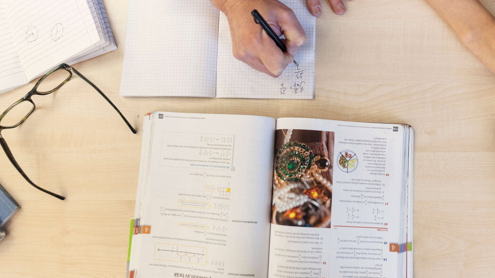 teacher with schoolboy doing homework in classroom 2024 10 18 05 40 18 utc edited 1